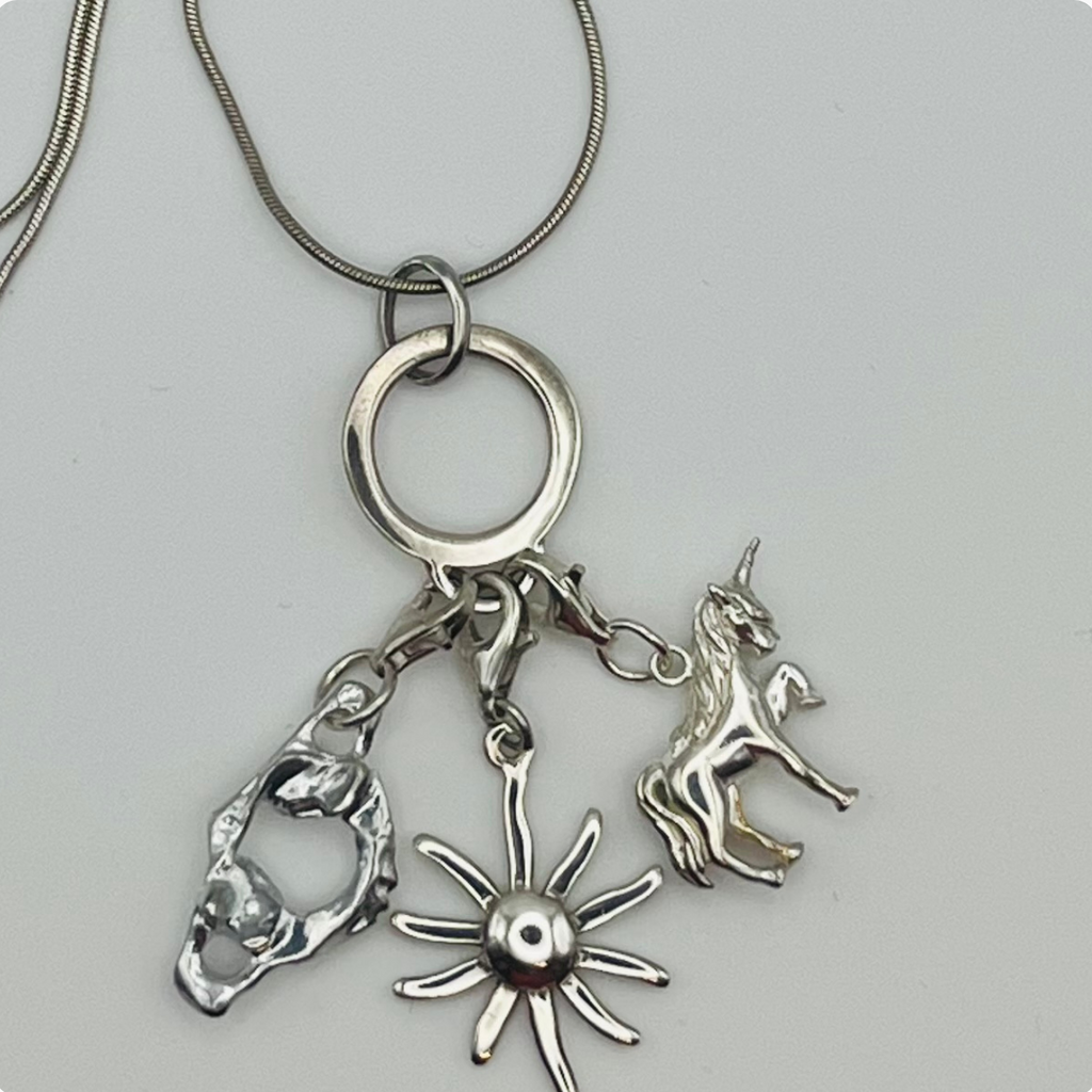 Sterling Silver Atlas, Sun, and Unicorn Necklace