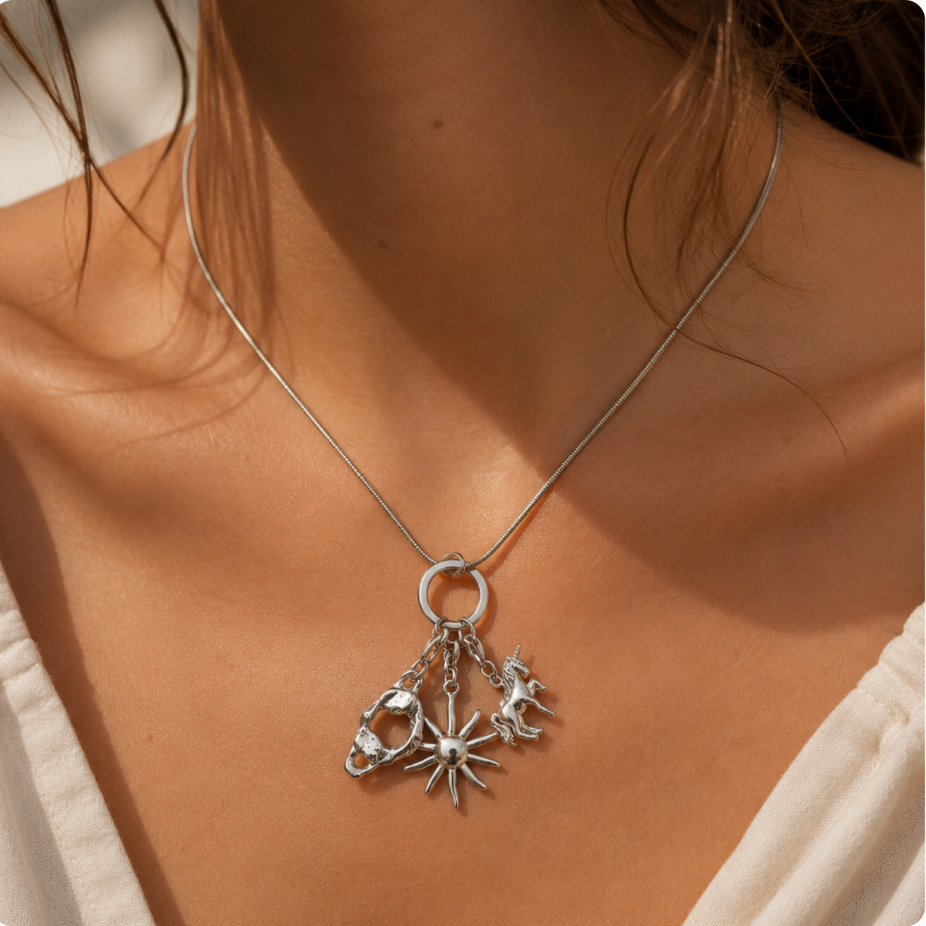 Sterling Silver Atlas, Sun, and Unicorn Necklace