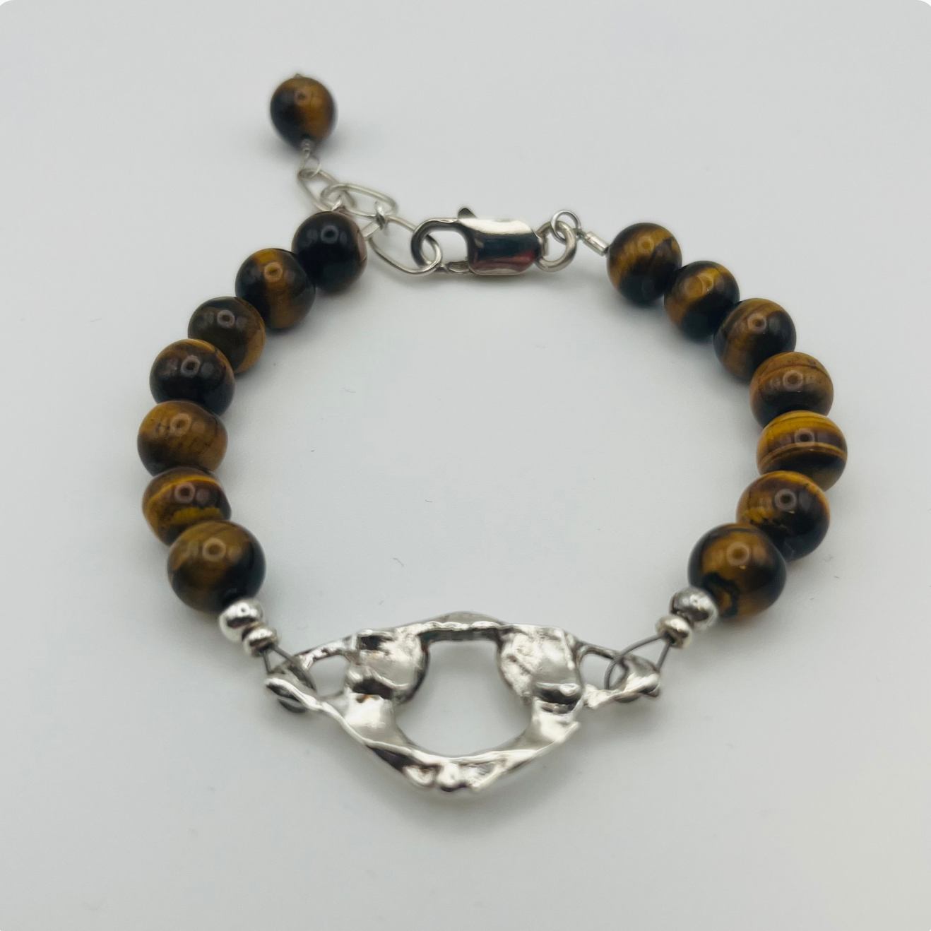 Sterling Silver Atlas Vertebra and Tiger's Eye Bracelet